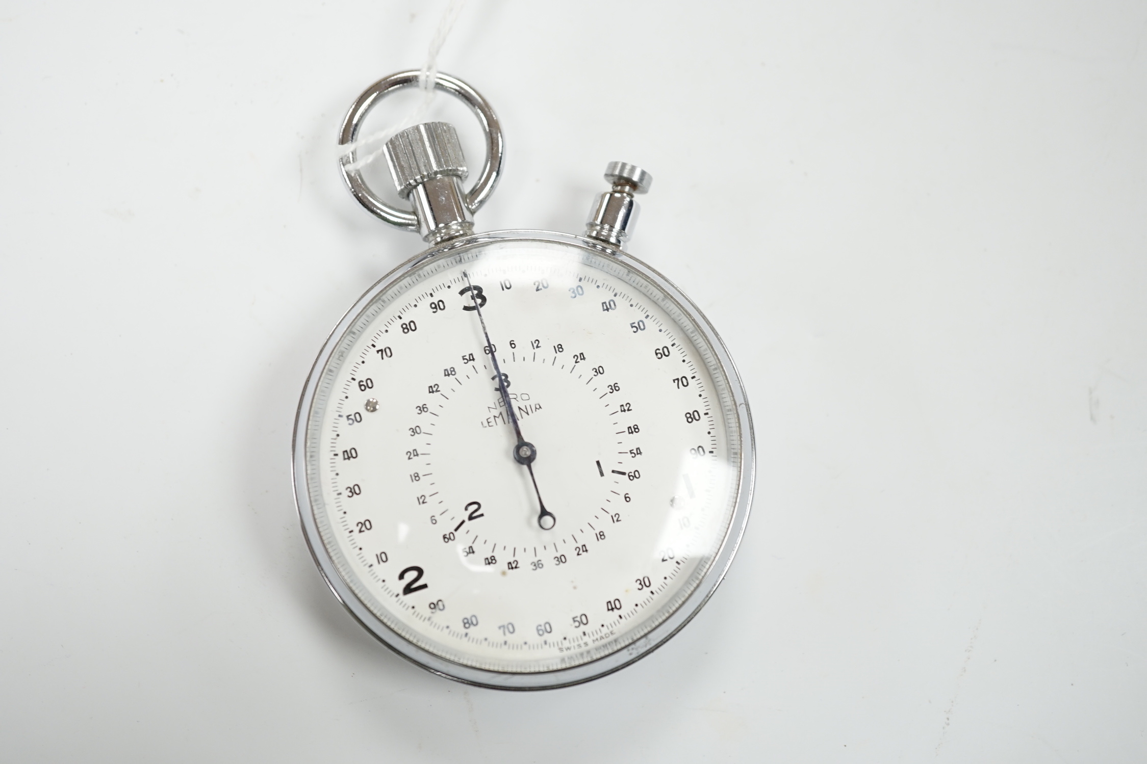 A chromium cased Lemania Nero stop watch, case diameter 62mm.